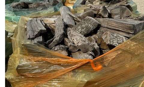 Bundled seasoned firewood ready for pickup